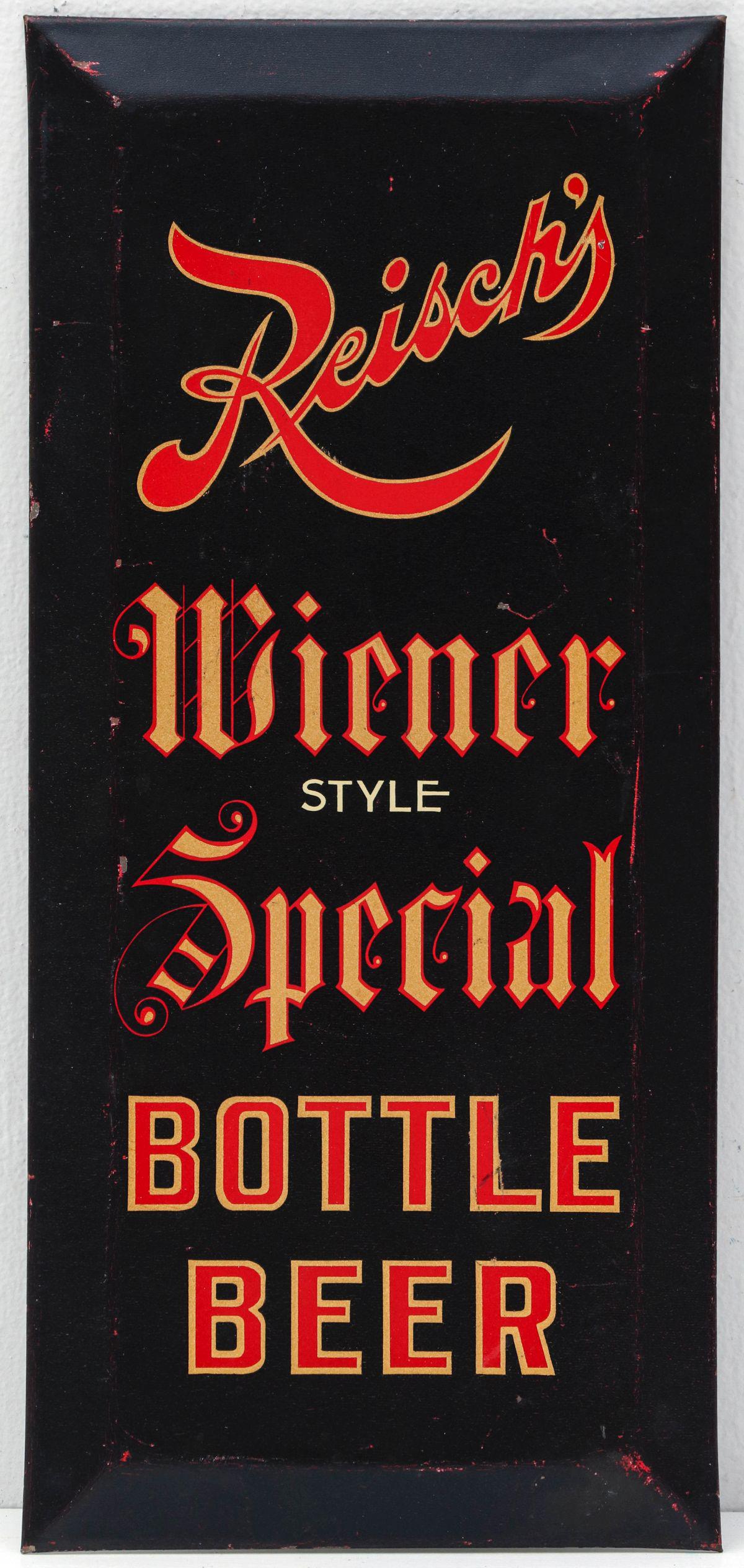 A REISCH'S WIENER STYLE SPECIAL BOTTLE BEER TIN SIGN: The pre-prohibition self framed lithographed tin sign made by the American Art Works for this Springfield, Illinois brewery. Measures 13.25 x 6 inches. We happily provide seamless in-house packing and