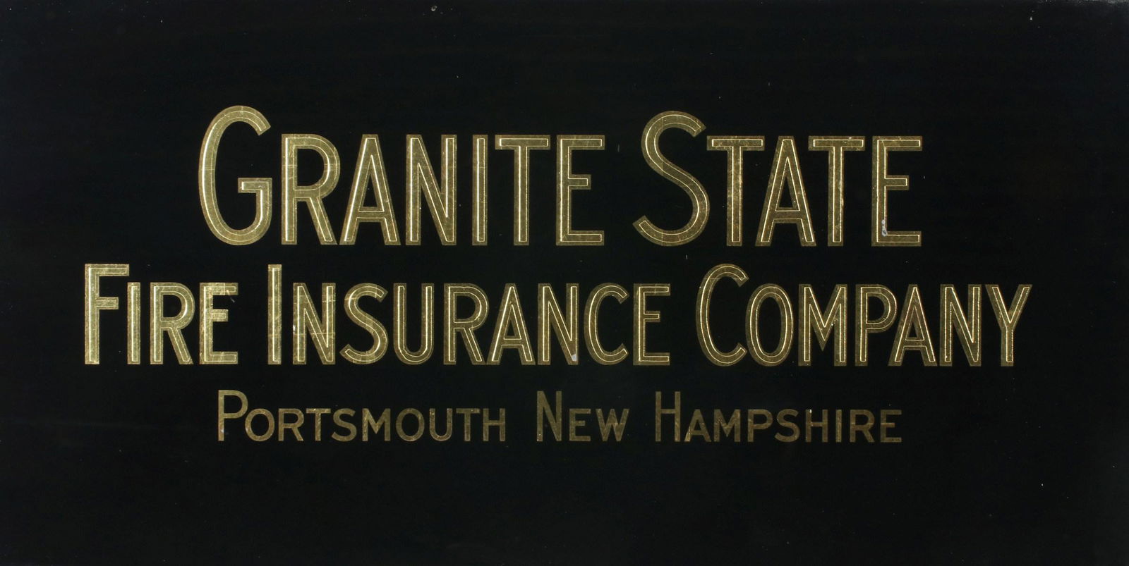 THREE REVERSE PAINTED INSURANCE SIGNS CIRCA 1930s: The framed glass panel with deeply etched and gilded lettering in reverse for GRANITE STATE FIRE INSURANCE COMPANY. And Citizens Insurance Company of New Jersey with blue background. Finally a brass s