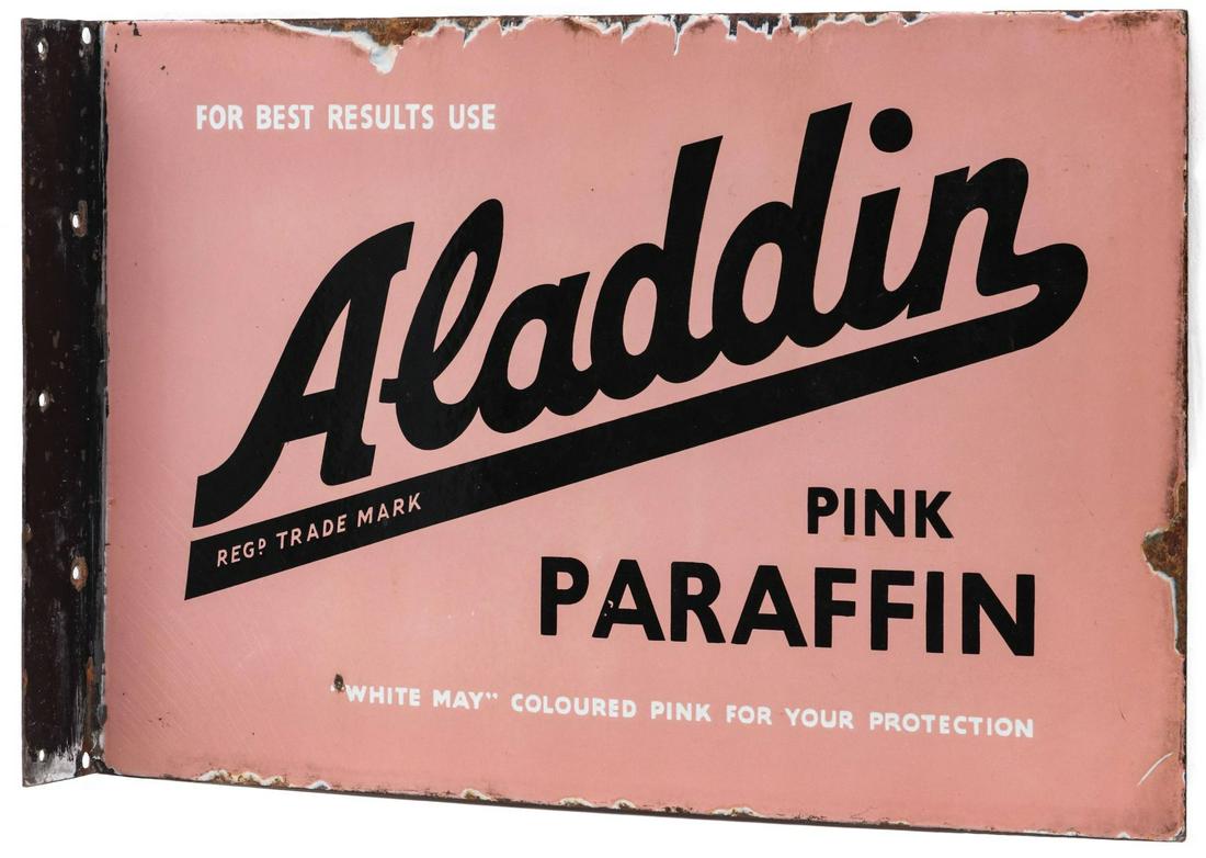 PORCELAIN ENAMEL FLANGE SIGN FOR ALADDIN PINK PARAFFIN: A black, white and pink flange sign advertising Aladdin Pink Paraffin, 'White May, Coloured Pink for Your Protection,' unsigned. Measures 12 x 18 x 2 inches. We happily provide seamless in-house packi