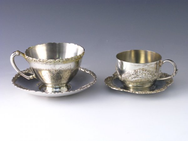 TWO FANCY QUAD PLATE SILVER CUP AND SAUCER SETS