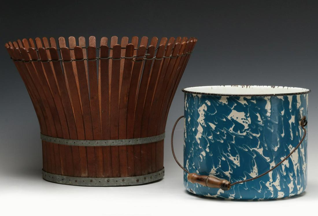 AN INTERESTING SLATTED BASKET AND GRANITE WARE BUCKET: The flaring basket of 46 wood slats bound in zinc and woven wire with wood bottom circa 1920; plus a blue swirl granite ware bucket. Measure 9 x 11 and 13 x 17 inches. We happily provide seamless in-h
