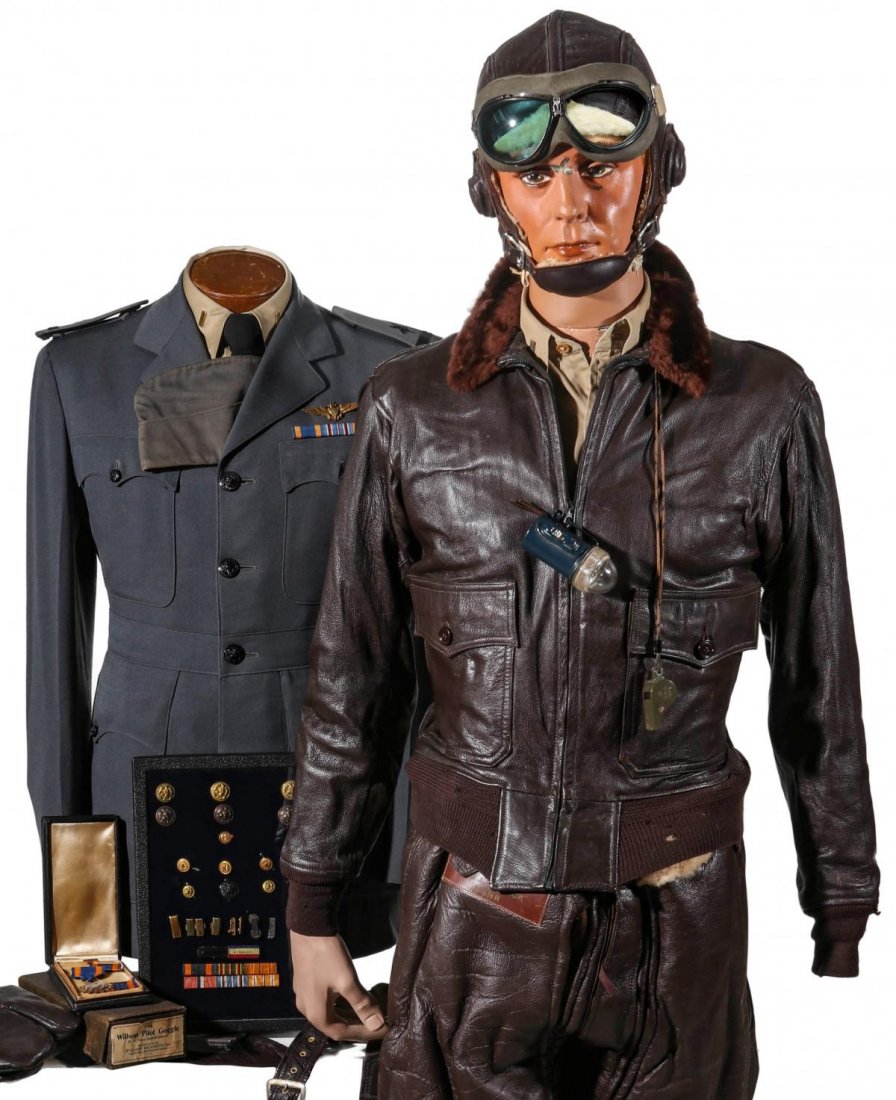 ENSIGN STRICK UNIFORM, FLIGHT SUIT, JACKET, HELMET ETC.: Ensign J.J. Strick, USNR, Patrol Bombing Squadron 131, Aleutian Islands. Mannequin #1 - Aviation uniform consisting of tunic with three place ribbon bar, pilot wings, shirt with rank insignia, garriso