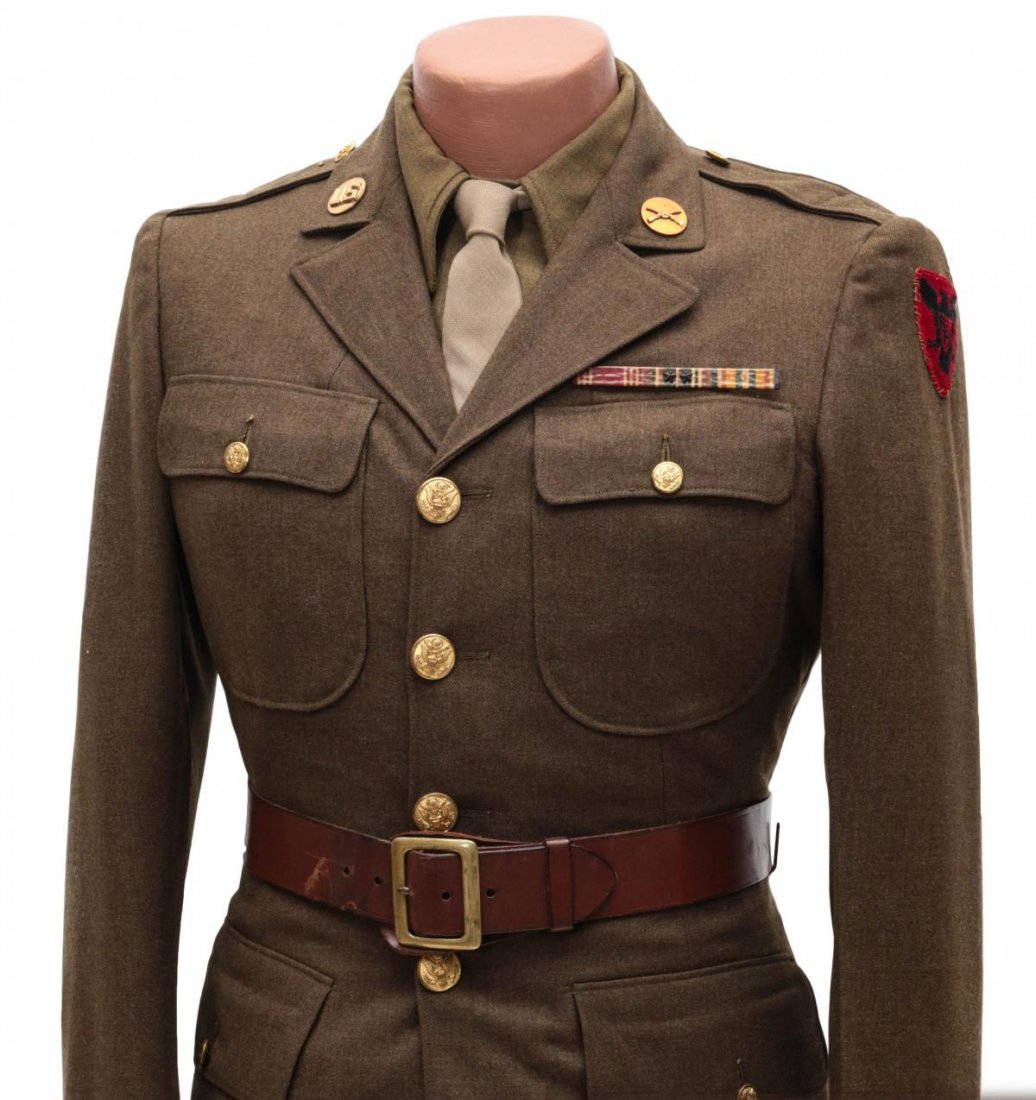 PVT SCHULTZ GROUP UNIFORM, BALL GLOVE, MEDALS SOUVENIRS: Private Herbert NMI Shultz, 86th Infantry Division, European Theatre. Service uniform with tunic and insignia, three place ribbon bar, shirt, tie, pants, garrison cap, waist belt, waist belt with nati