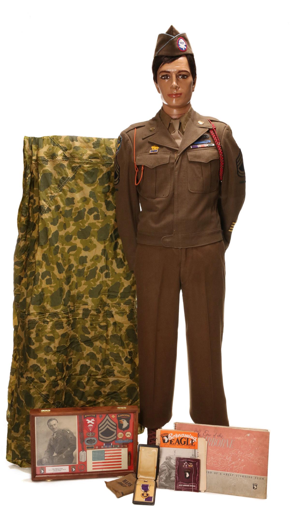 T/SGT WM DRAGON 1ST, UNIFORMS, PURPLE HEART, ARCHIVE: T. Sgt. William H Dragon, HQ Co., 3rd Battalion, 2nd PIR, 1st Abn. Division. Ike uniform consisting of jacket with all insignia, shirt pants, belt, tie and garrision cap. Boots are a later addition an