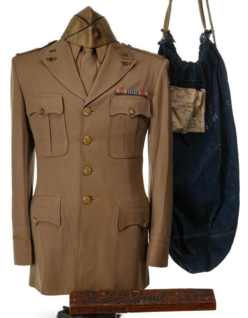 1ST LT. ELIAS E. ZIRUL, AAF CHEMICAL CORPS UNIFORMS: 1st Lieutenant, Elias E Zirul, Army Air Force Chemical Corps. Summer service uniform with tunic, three service ribbons, shirt, tie, pants (x2) and garrison cap. Also includes a desk plate, ID card, na