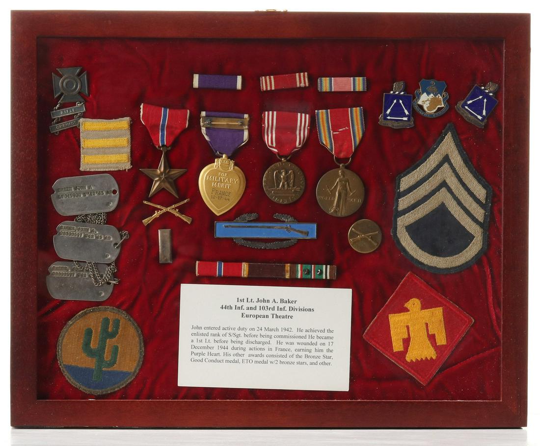 1ST LT BAKER 44TH INF GROUP W/BRONZE STAR, PURPLE HEART: Shadow Box containing: CIB, clutch back; three Dog Tags with chain; 44th Inf. Div., SSI; 103rd Inf. Div., SSI; three place ribbon bars; Bronze Star Medal; Purple Heart Medal, engraved with country and