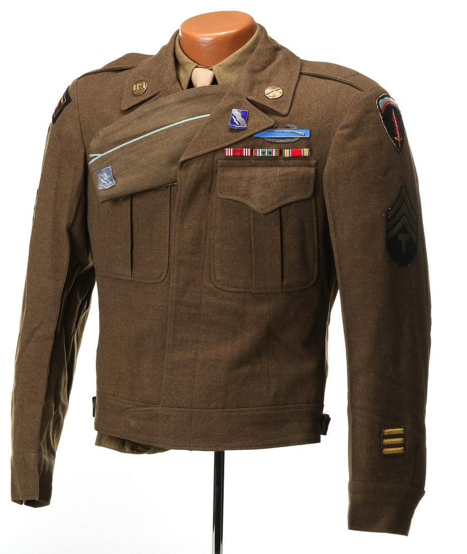 T. SGT. ORLO HUDSON IKE UNIFORM, 398TH INF., EUROPE: Technical Sergeant Orlo Hudson, 398th Infantry Regiment. Uniform consisting of Ike jacket with all insignia, pants, garrison cap, shirt, tie, three place ribbon bars, CIB. 4x6 metal box with US Forces