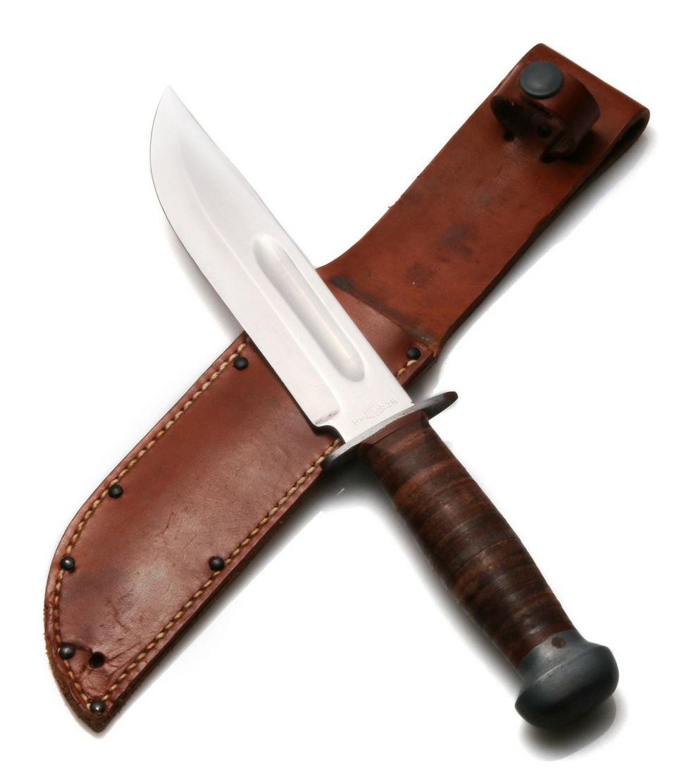 WWII U.S. NAVY RH PAL 35 FIGHTING KNIVES: A WWII RH-PAL-36 FIGHTING KNIFE Marked RH Pal 36 on the blade, made in the USA, retains the original leather sheath. WWII U.S. NAVY MARK 1 RH PAL 35 FIGHTING KNIFE Maker's marks on the blade, matching