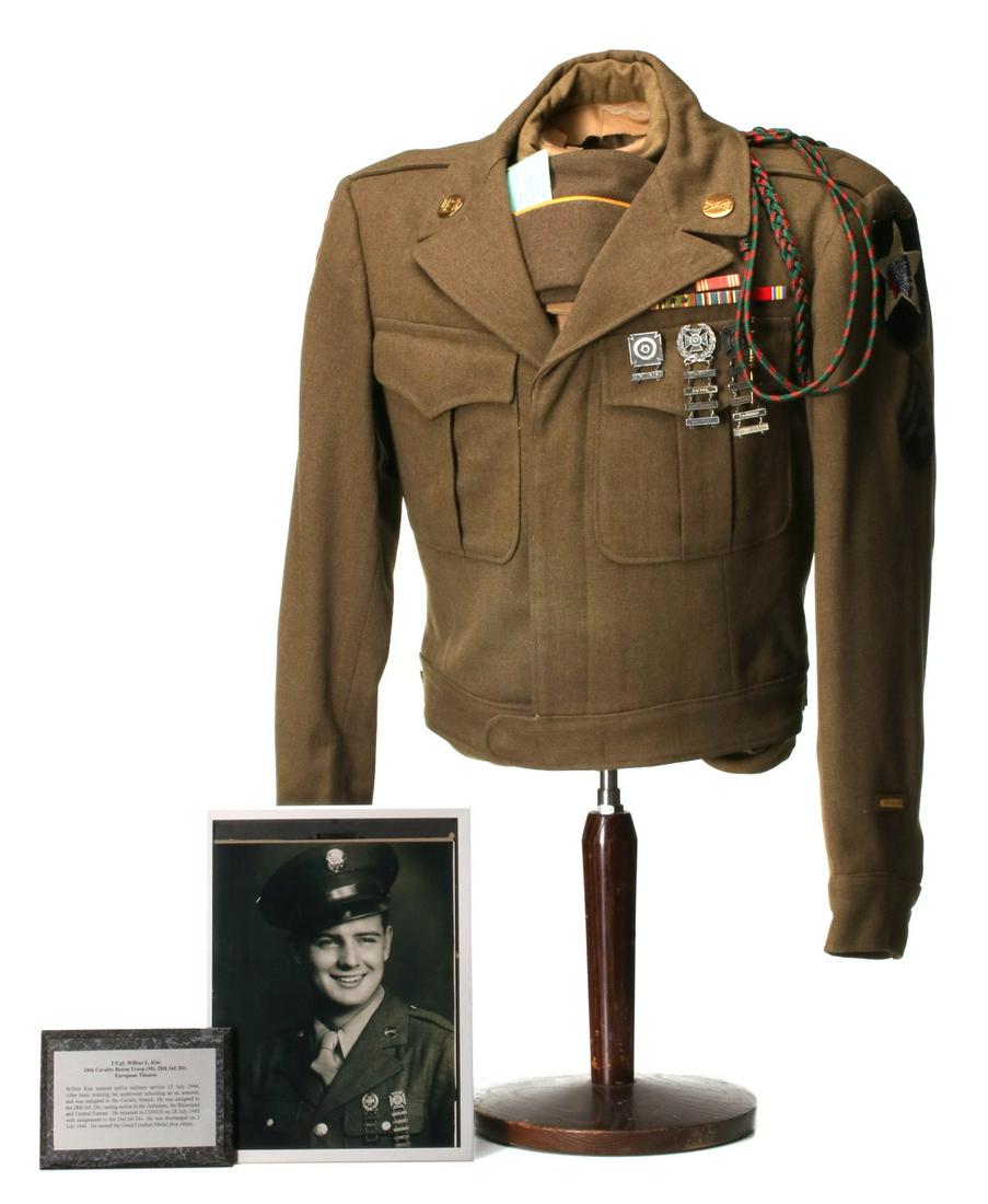 T/CPL WILBUR L. KITE IKE JACKET WITH BARS AND BADGES: Uniform belonging to T/Cpl. Wilbur L. Kite consisting of Ike jacket with rank stripes, 2nd Infantry Div and 5th Infantry Div SSI's, four place ribbon bars, three qualification badges, French shoulder 