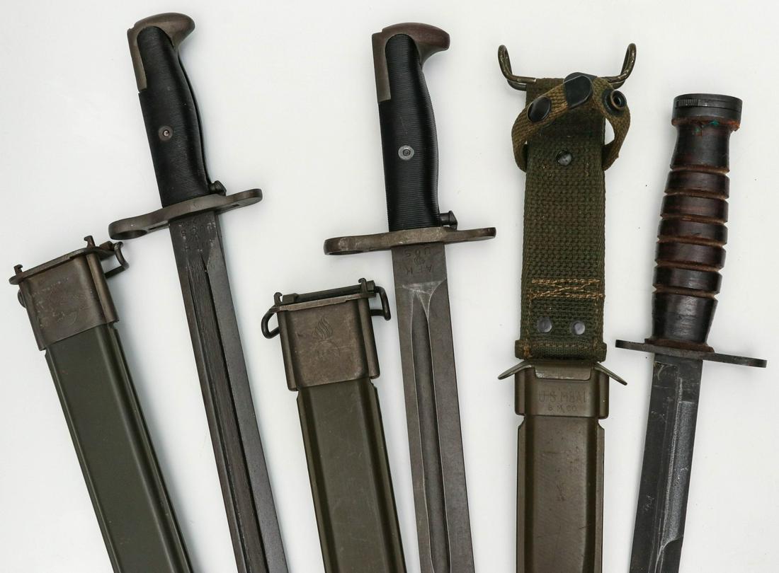 THREE US WWI BAYONETS: M-1942 bayonet with scabbard; Cut down M-1942 bayonet with scabbard; carbine bayonet with M8A1 scabbard. All veteran attributions and histories have been provided by the consignor and are believed to 