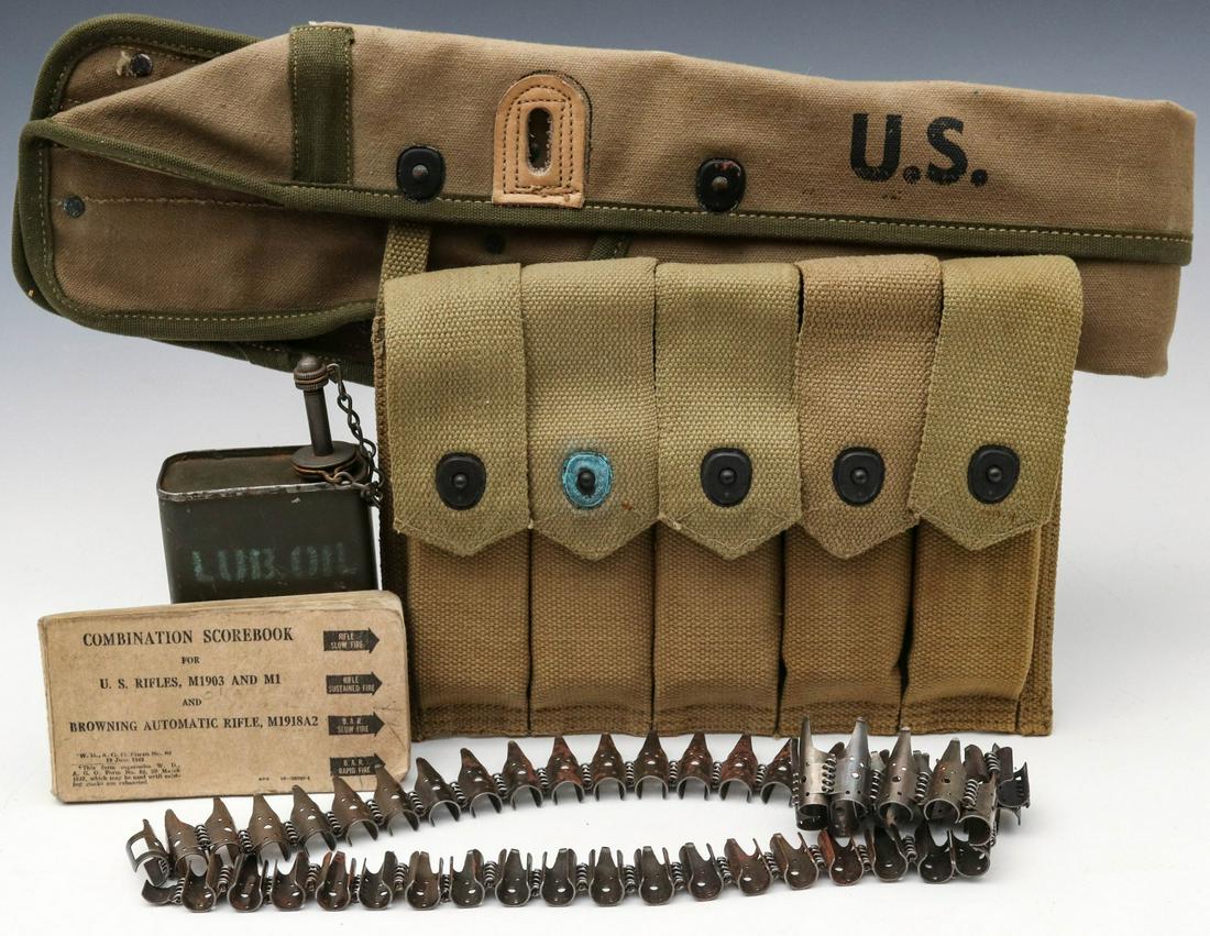 US WWII CARBINE SCABBARD, MAGAZINE POUCHES ETC: SMG magazine pouch with five 20 round magazines; German MG42 belt strip; M-1 Carbine holster; Machine gun lube oil tin; Score book named to Pvt. Charles Myers. All veteran attributions and histories h