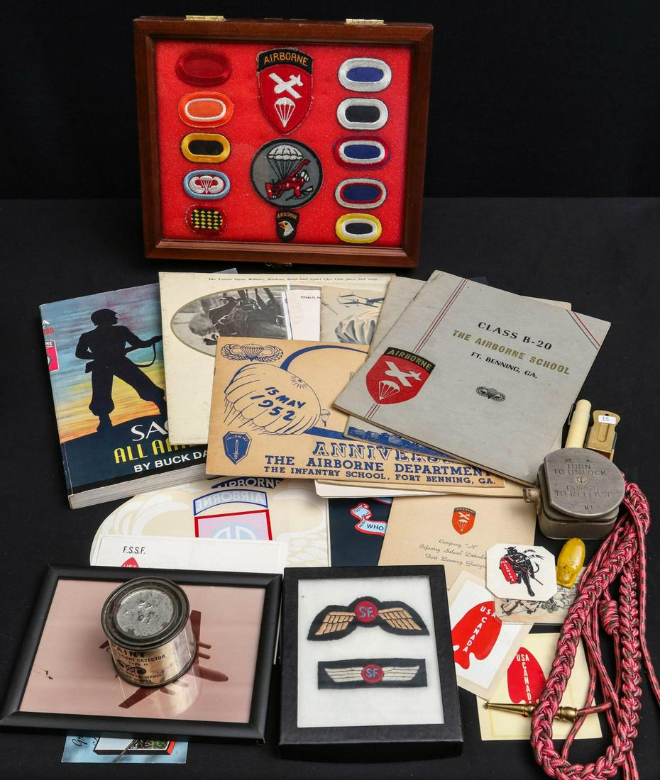 AIRBORNE AND FIRST SPECIAL SERVICE FORCE GROUPING: Shadow box containing ten Airborne ovals, 101st miniature cloth DI, Airborne Command SSI, 508th jacket patch. Book 'Saga of the All American' with author's dedication to 82nd Vet; original German stud