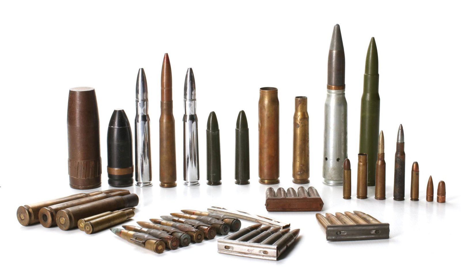 BELTED AND OTHER LIVE AMMUNITION WWI AND WWII: Lot of live and training ammo includes 30 caliber carbine bandolier, 45 caliber revolver ammo pouches with three moon clips of live ammo, belted live 7.92 ammunition dated 1942, box of 20 live rounds 