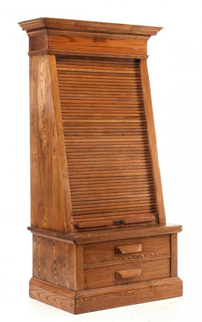 A GOOD OAK TAPERING ROLL FRONT TICKET CABINET C. 1880 (1 of 12)