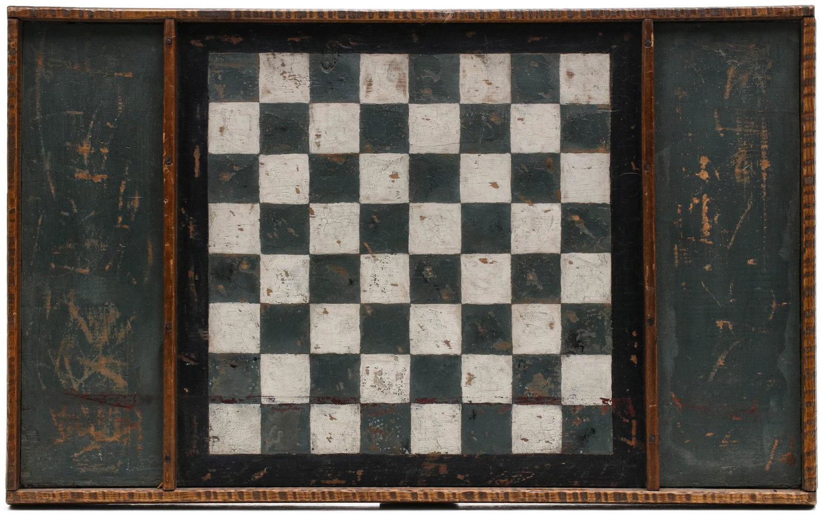 AN UNUSUAL 19TH C. AMERICAN GAME BOARD IN TIGER MAPLE: The dark green and white game surface with divided ends framed in a rich, highly figured tiger maple frame, early forged iron nails. Measures 14.75 x 24 x 1.5 inches. Provenance: The Jerry and Cathy M