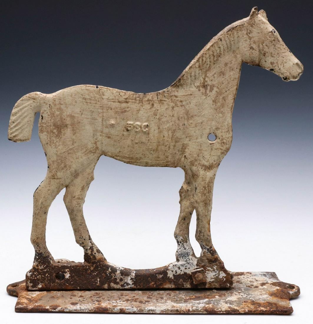 A DEMPSTER MILL BOB-TAIL HORSE WINDMILL WEIGHT: The Dempster Mill Manufacturing Company bob-tail horse windmill weight in white paint, marked 58G, mounted on period, probably original, iron box cover. Measures 17 x 17.5 x 6 inches. Provenance: The 