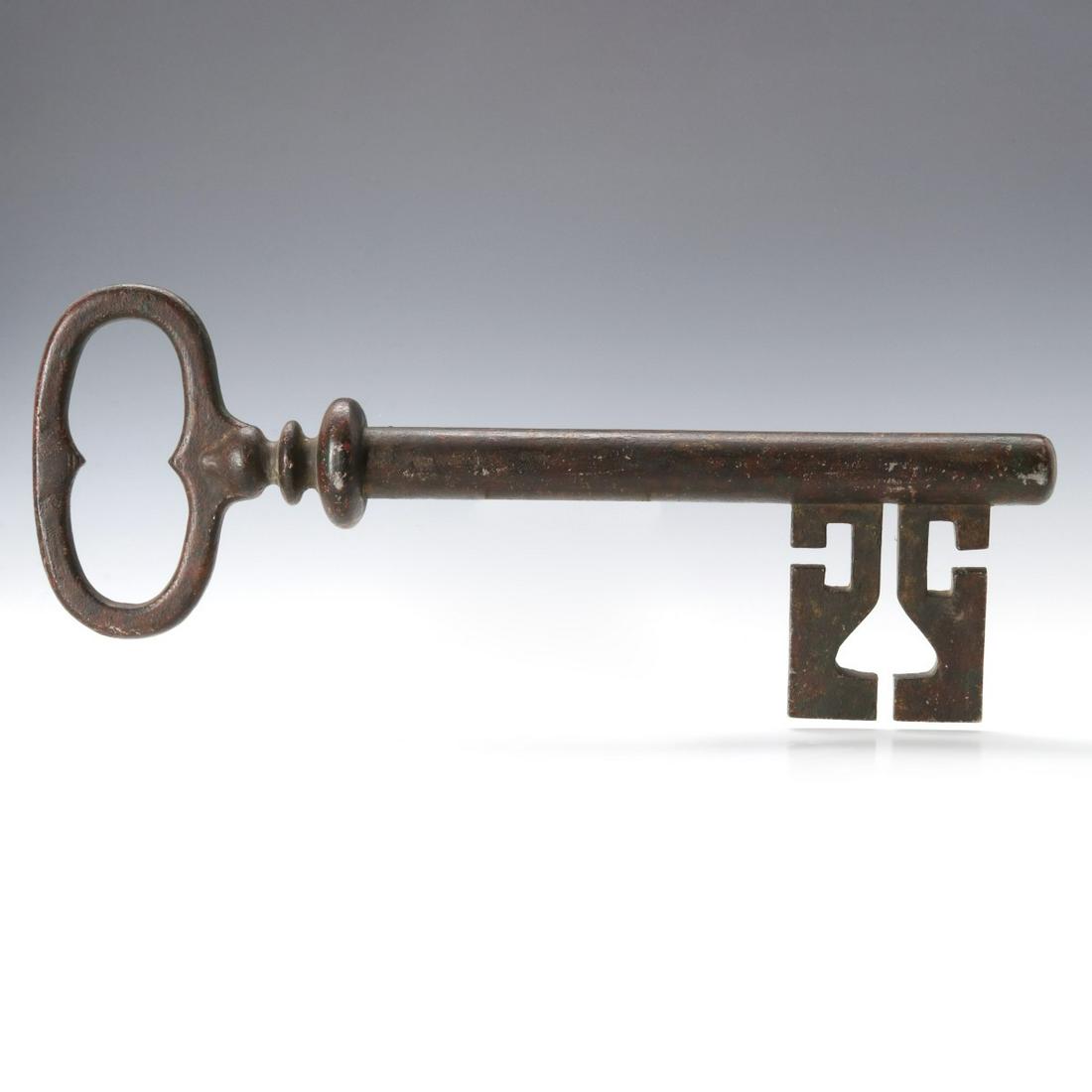 A LARGE 19TH C ZINC SKELETON KEY LOCKSMITH'S TRADE SIGN: The detailed hollow three-dimensional cast zinc model with openwork bit and nice surface overall. Measures 10.5 x 23 x 3 inches. Provenance: The Jerry and Cathy Mueller Collection, Sioux City, Iowa We