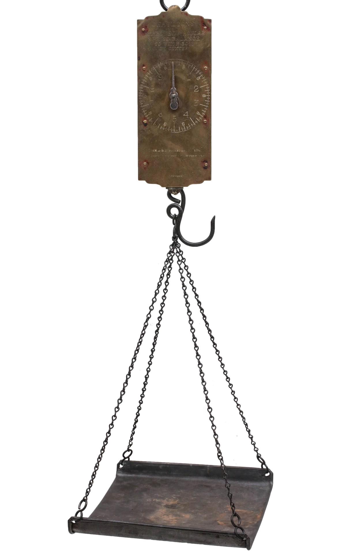 A SUSPENDED BRASS DIAL SCALE WITH TIN PAN: The Chatillion's scale etc as shown. Measures 21 x 12 x 10 inches. Provenance: The Jerry and Cathy Mueller Collection, Sioux City, Iowa We happily provide seamless in-house packing and shipping servic