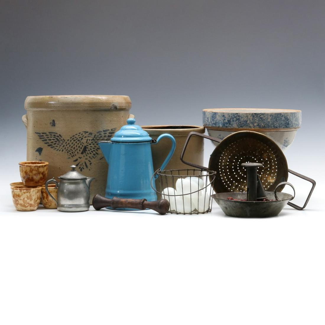 A COLLECTION OF STONEWARE, GRANITE WARE, TIN AND PEWTER: An open stoneware crock with cobalt stenciled American eagle and numerous chips; open salt glazed crock, a Bristol glaze stoneware bowl with blue sponge decoration, tin, brass, wire and modern pewter.