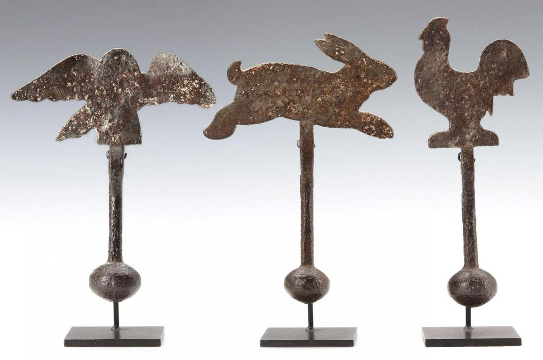 A MATCH SET OF IRON SHOOTING GALLERY SPINNER TARGETS: Rabbit, rooster and eagle sheet iron silhouette figures on weighted shafts with pivot holes and the same cast reinforcements found on star and bird targets being offered in this auction known to be ma
