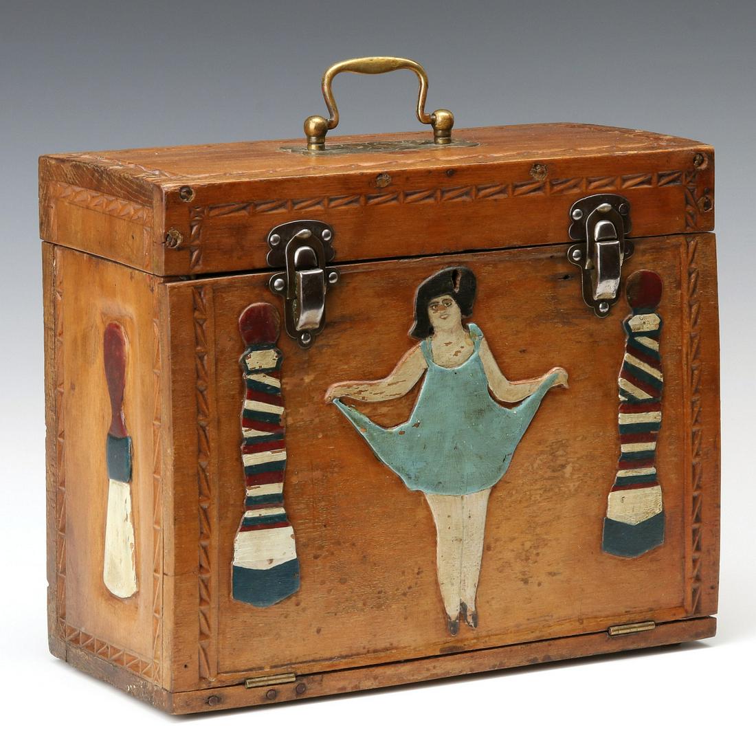 AN AMERICAN CLASSIC FOLK ART BARBER'S BOX CIRCA 1920s: Tony the Barber's traveling shave kit box made by hand employing some found hardware, the upright form with hinged top and front, all four sides and top outlined by incised chip carved border, the fro