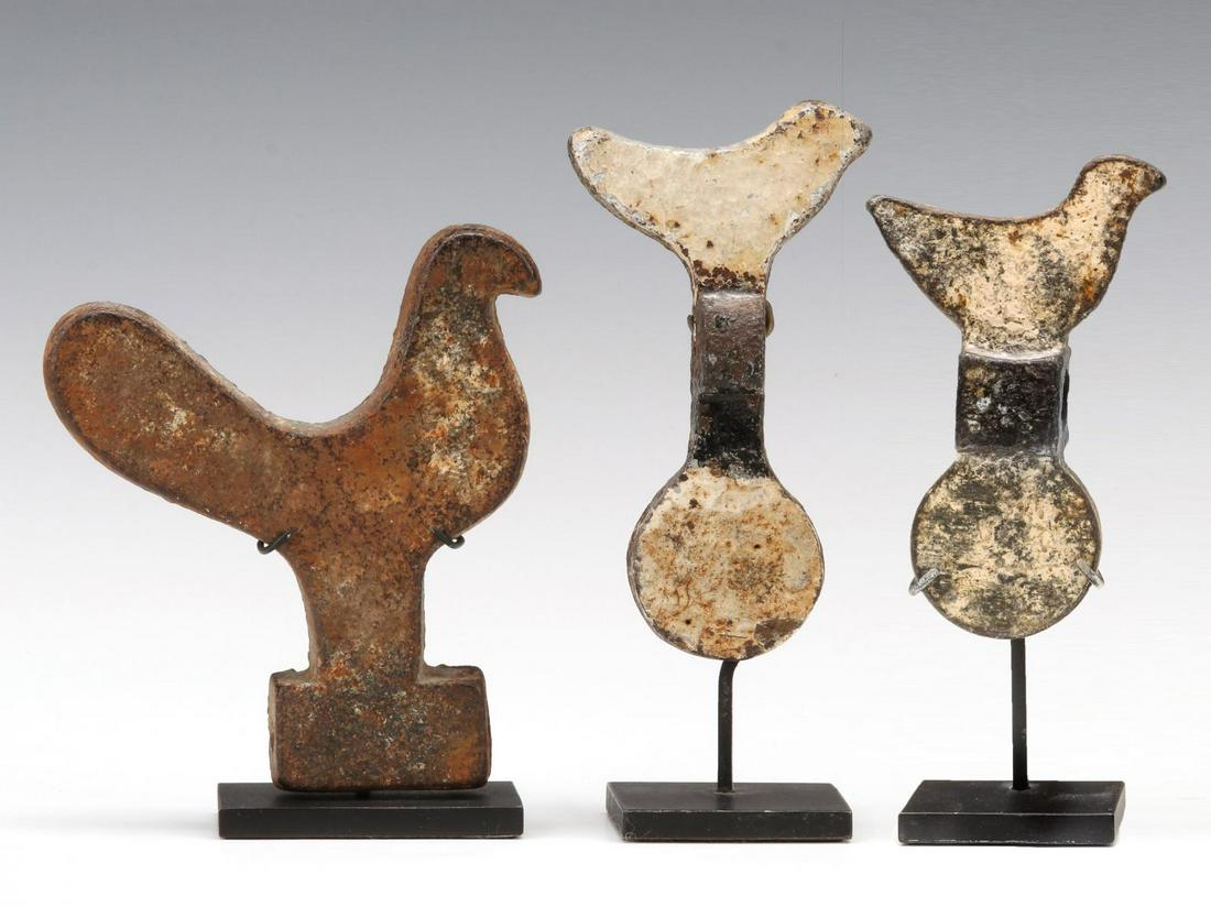 EARLY 20TH C. BIRD AND SPINNER SHOOTING GALLERY TARGETS: The two Bird and Circle spinner targets grouped along with a stylized rooster form, unknown makers, these are the only examples known to date, the spinners were purchased together. Pictured on page 84