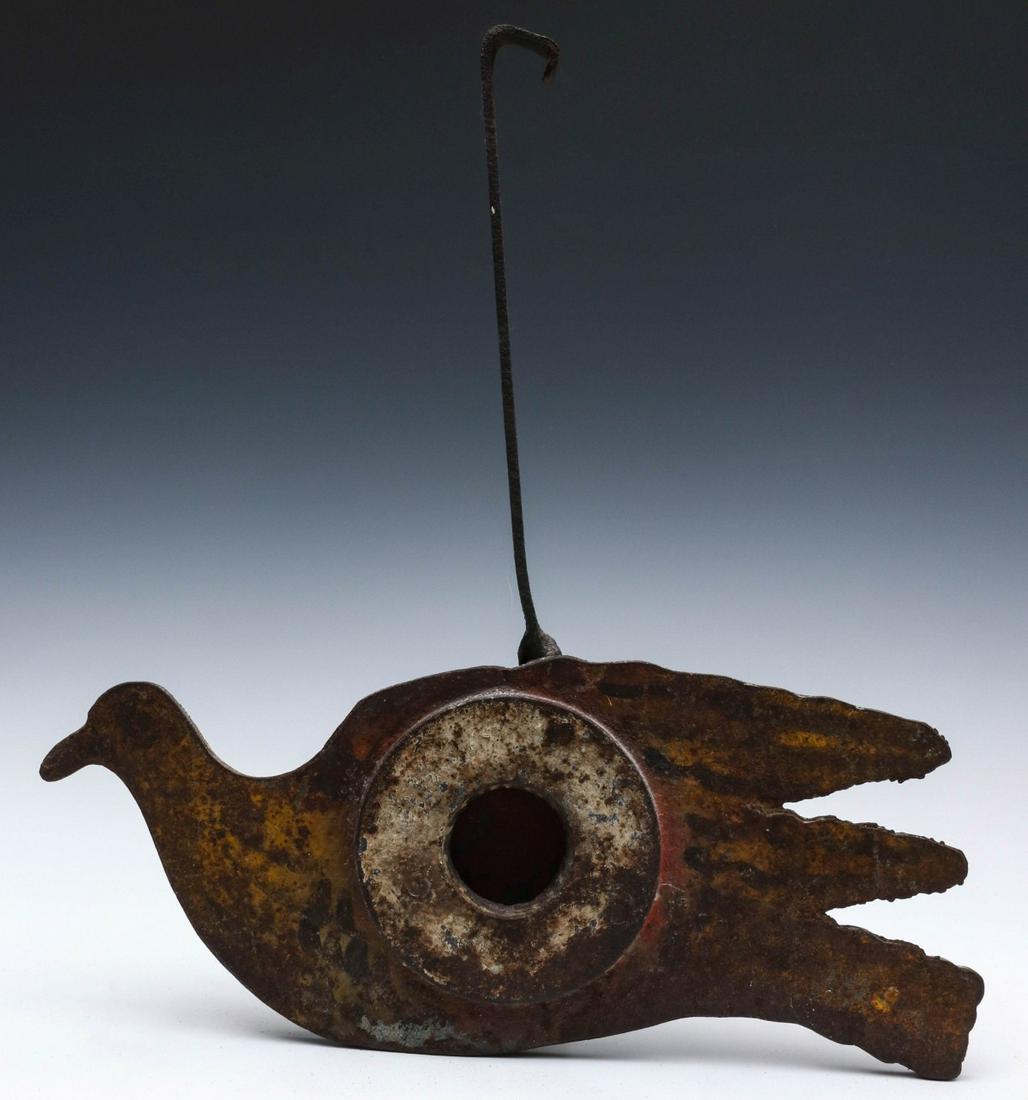 A GOOD WURFFLEIN SWINGING BIRD SHOOTING GALLERY TARGET: The very rare cast iron bird target in amazing original paint and dry original overall surface complete with original iron rod and red gong. Targets of this rare type would swing from side to side abo