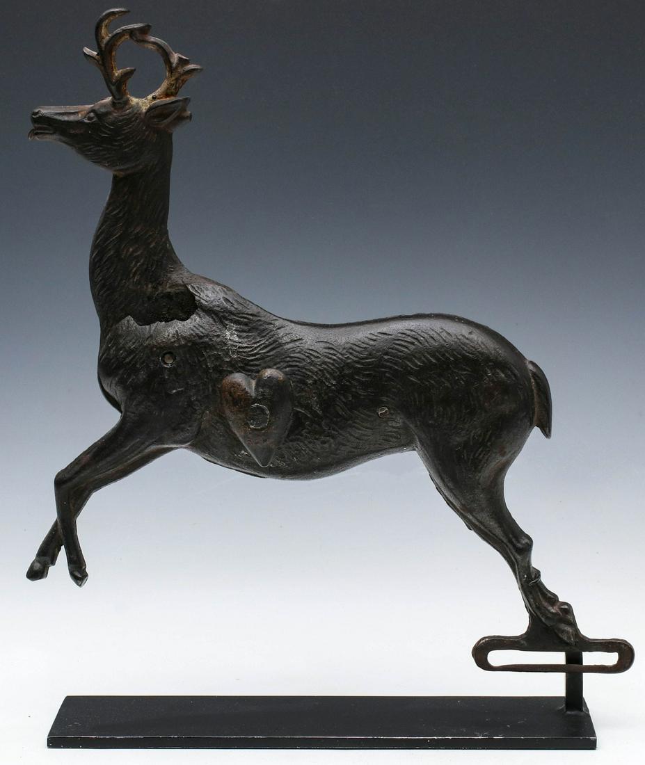 A C.W. PARKER ANIMATED DEER SHOOTING GALLERY TARGET: The figure of a deer with texture as fur, integral antlers and tongue sticking out in true quirky Parker fashion. The head and neck on pivot at the shoulder drops forward when the protruding three-dim