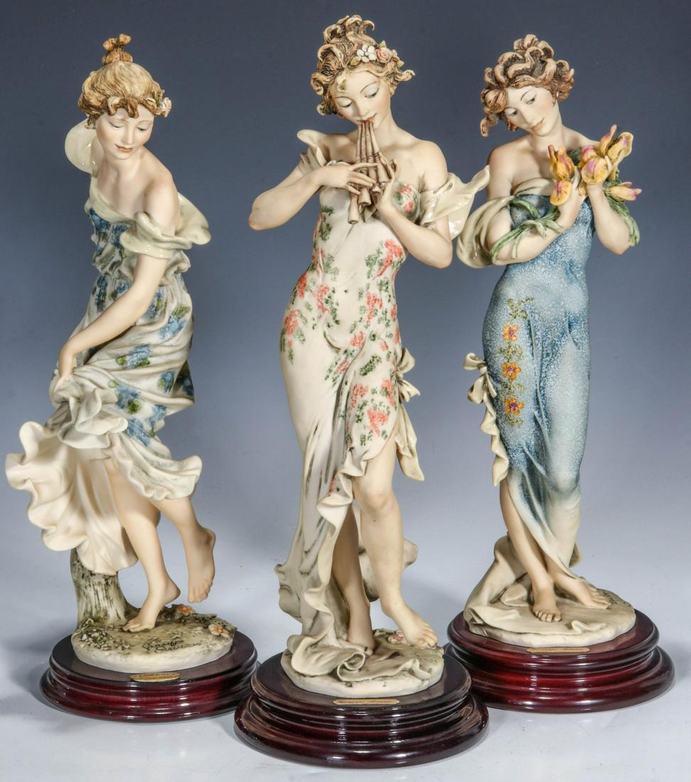GIUSEPPE ARMANI COLLECTOR SOCIETY FIGURES: Three figures 'Melody,' 'Allegra' and 'Iris,' signed on the bases and marked with Society or Event logos, dated 1995 and 1996. Measures 15 x 4.75 to 14.25 x 4.75 inches. We happily provide seamless in