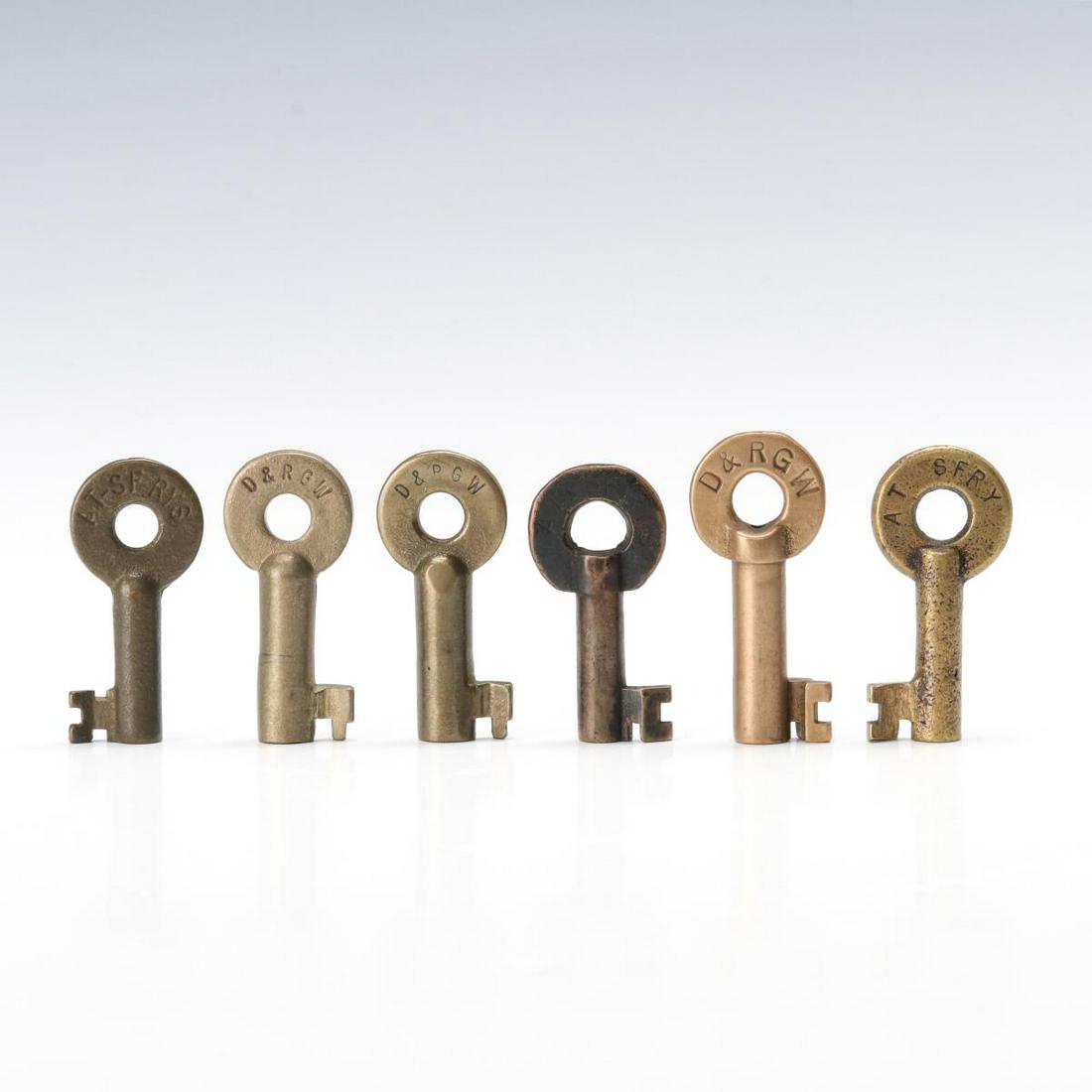 A COLLECTION OF AT&SF AND D&RGW RAILROAD KEYS (1 of 8)