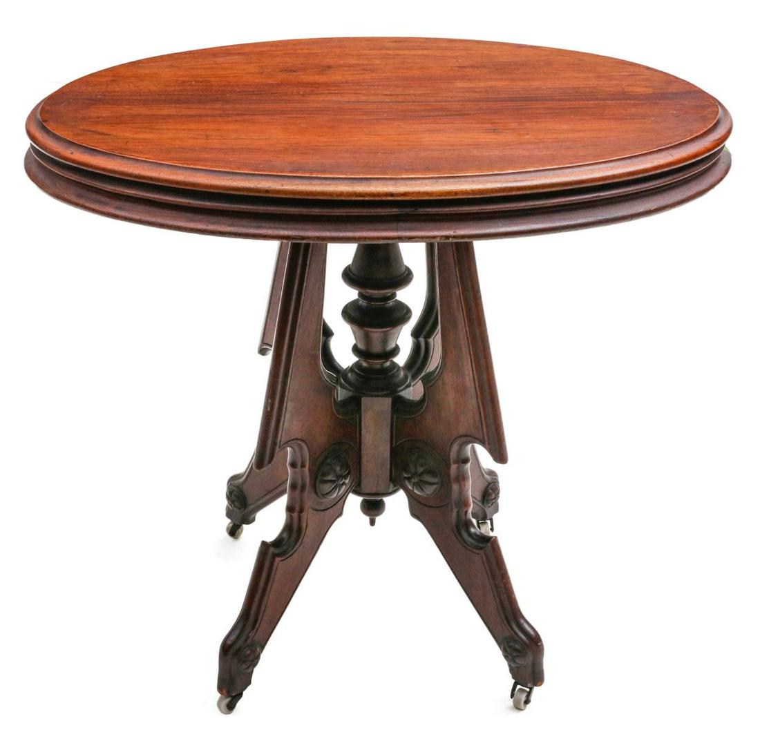 A 19TH C. WALNUT VICTORIAN PARLOR TABLE WITH OVAL TOP (1 of 7)