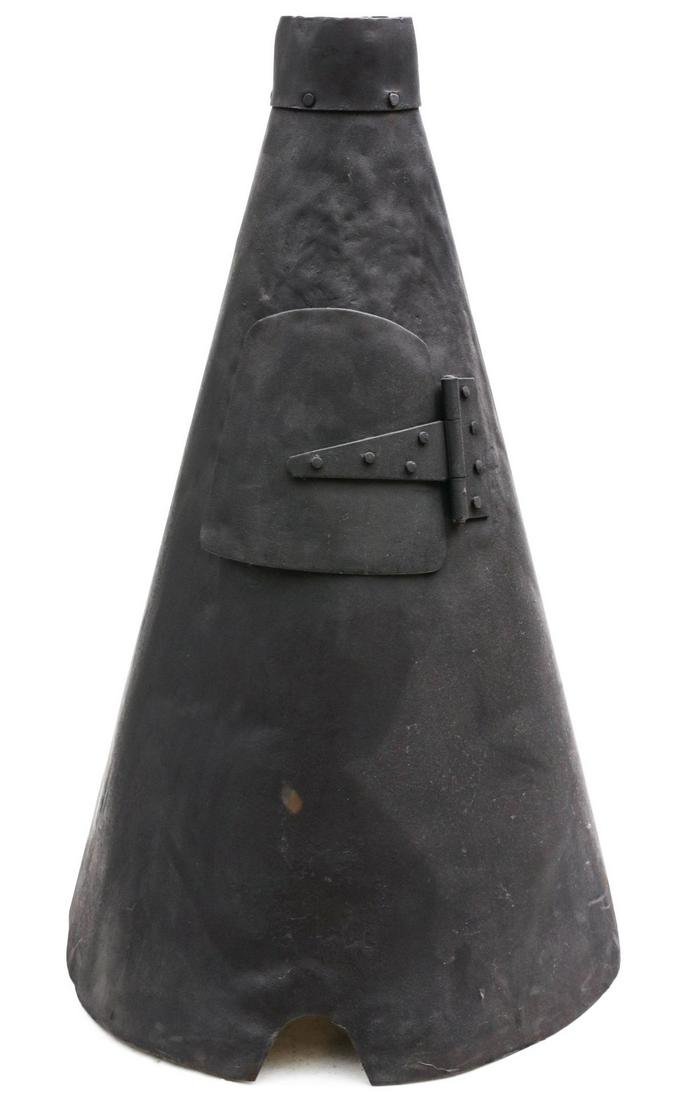 A SIBLEY IRON STOVE CIRCA 3RD QUARTER OF 19TH CENTURY: Th iconic conical shape with riveted iron top collar and upper door with riveted hinge. The Sibley design was patented in 1856 and is most associated with the Civil War. Provenance has it that this pa