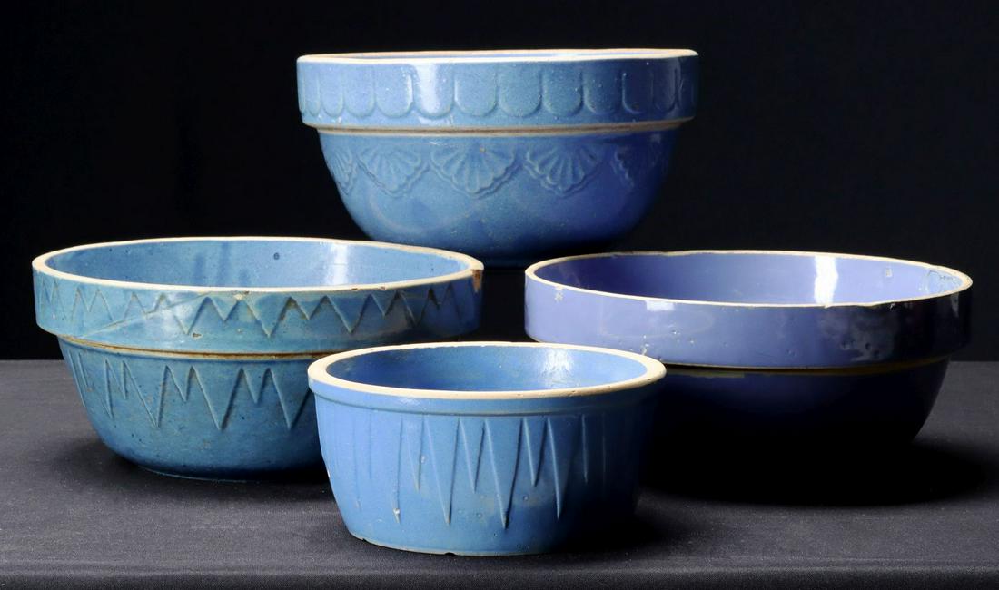 A COLLECTION OF BLUE GLAZED STONEWARE MIXING BOWLS (1 of 3)