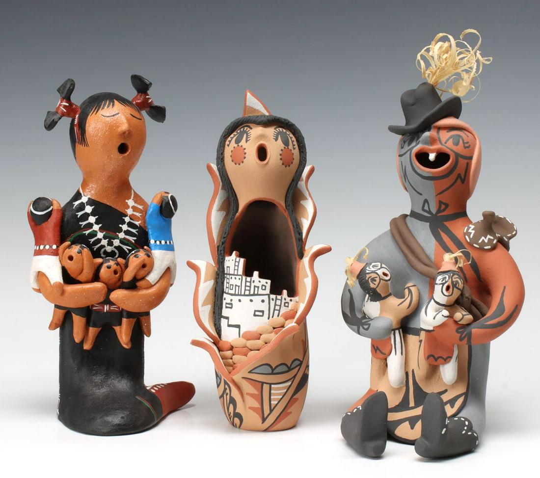 JEMEZ AND COCHITI PUEBLOS POTTERY STORYTELLERS: A Jemez Corn Maiden doll signed Rose T. Fragua; a Cochiti Storyteller doll signed Pablo Quintana, Cochiti, NM; and a Jemez storyteller Clown, One Tooth doll signed Rose Fragua. Sizes range from 9 x 4