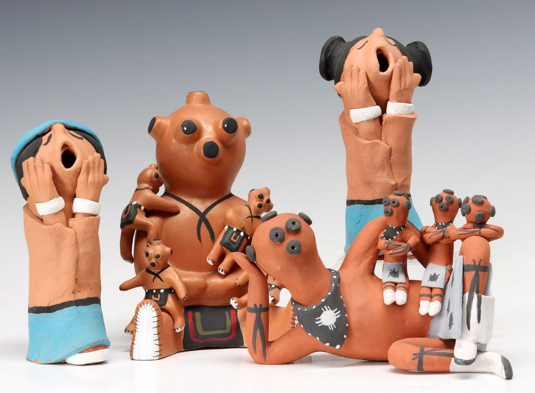 FOUR MUDHEAD AND STORYTELLER PUEBLO POTTERY FIGURES (1 of 16)