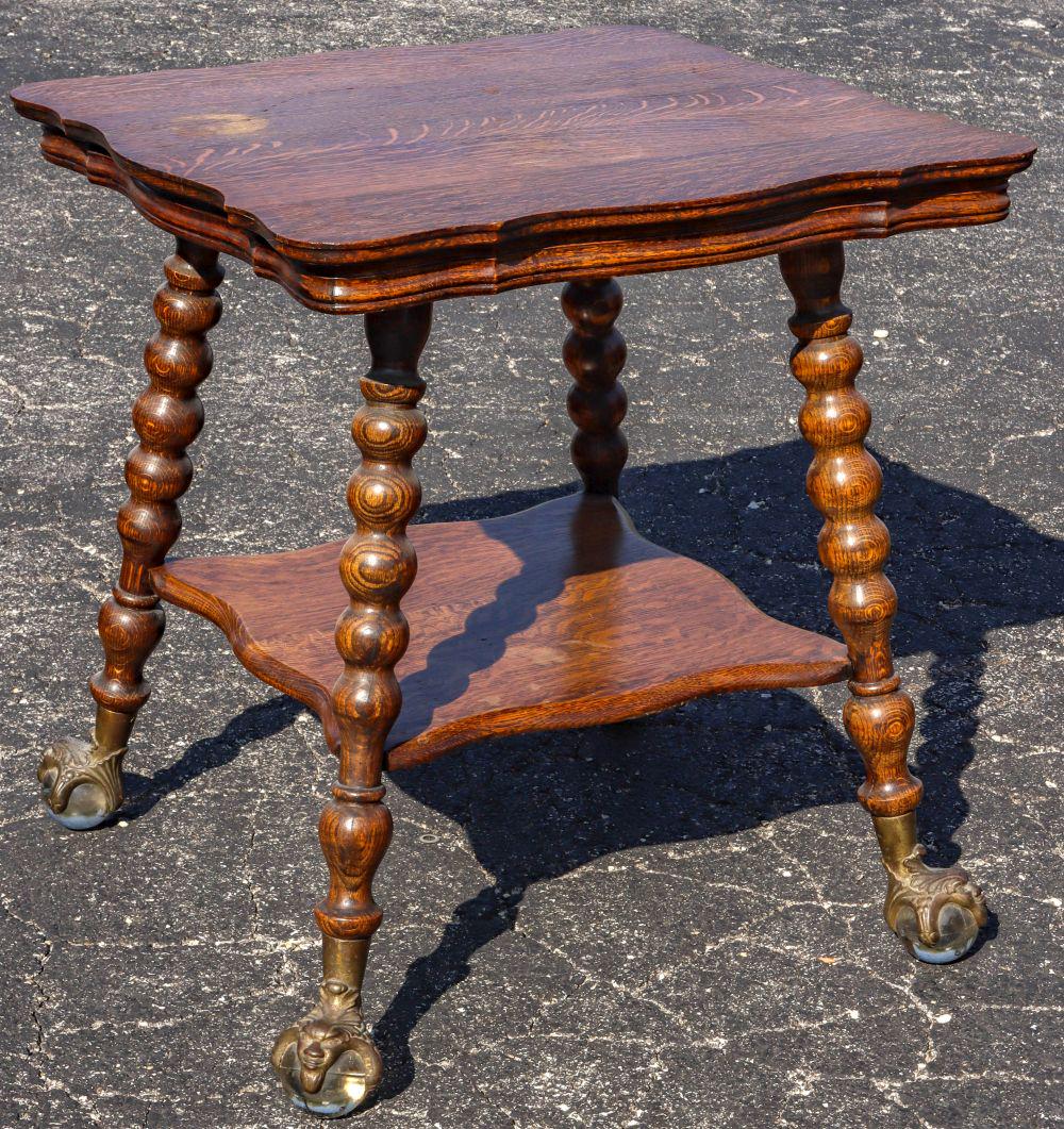 A CIRCA 1900 OAK TABLE WITH LARGE GLASS BALL/CLAW FEET (1 of 4)