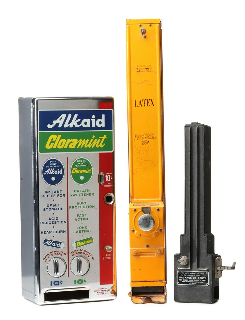 VINTAGE MINT AND CONDOM COIN OP VENDING MACHINES: The chrome front machine with colorful graphics advertising Alkaid and CLORAmint, plus a 25 cent condom machine. Measures 19 x 3 x 6.5, 22 x 9 x 6.5 and 30.75 x 4 x 7 inches. We happily provide seamle