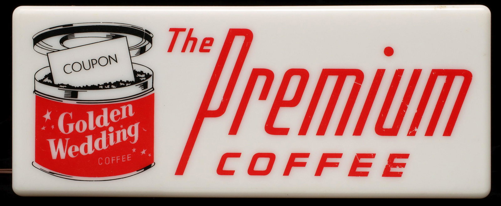 A MID 20TH C. GOLDEN WEDDING COFFEE ADVERTISING SIGN: The while plastic front with red lettering, a lighted sign with tin back can. Measures 6.25 x 15.5 x 4 inches. We happily provide seamless in-house packing and shipping services on nearly everything w