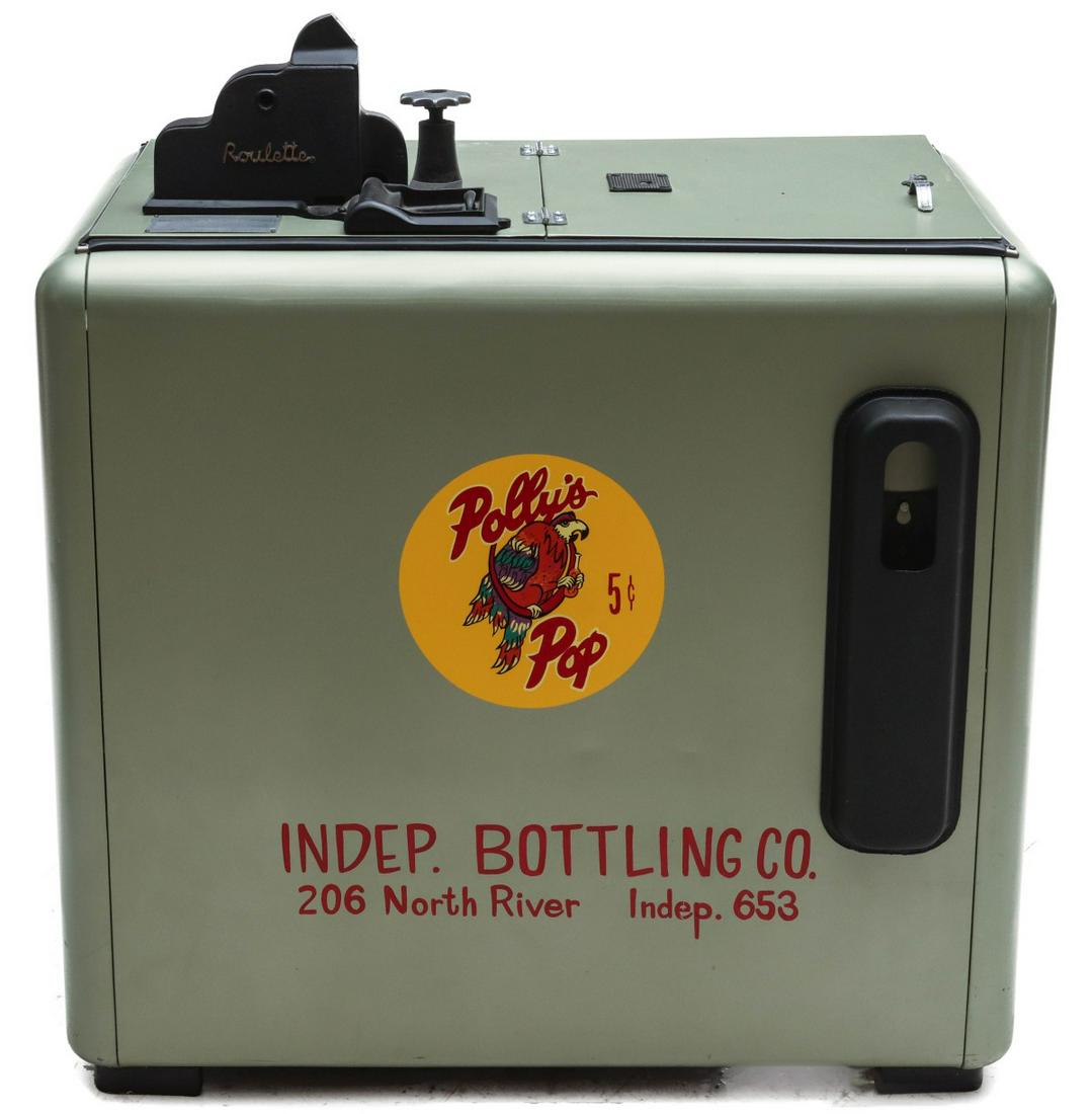 A COIN OPERATED BERNITZ 'ROULETTE' COOLER FOR POLLY POP: The dispensing cooler made by Bernitz of Kansas City was originated in a Polly's Pop retail store, according to the owner, Jerry Slover. The restored exterior has Polly graphics and the exterior compo