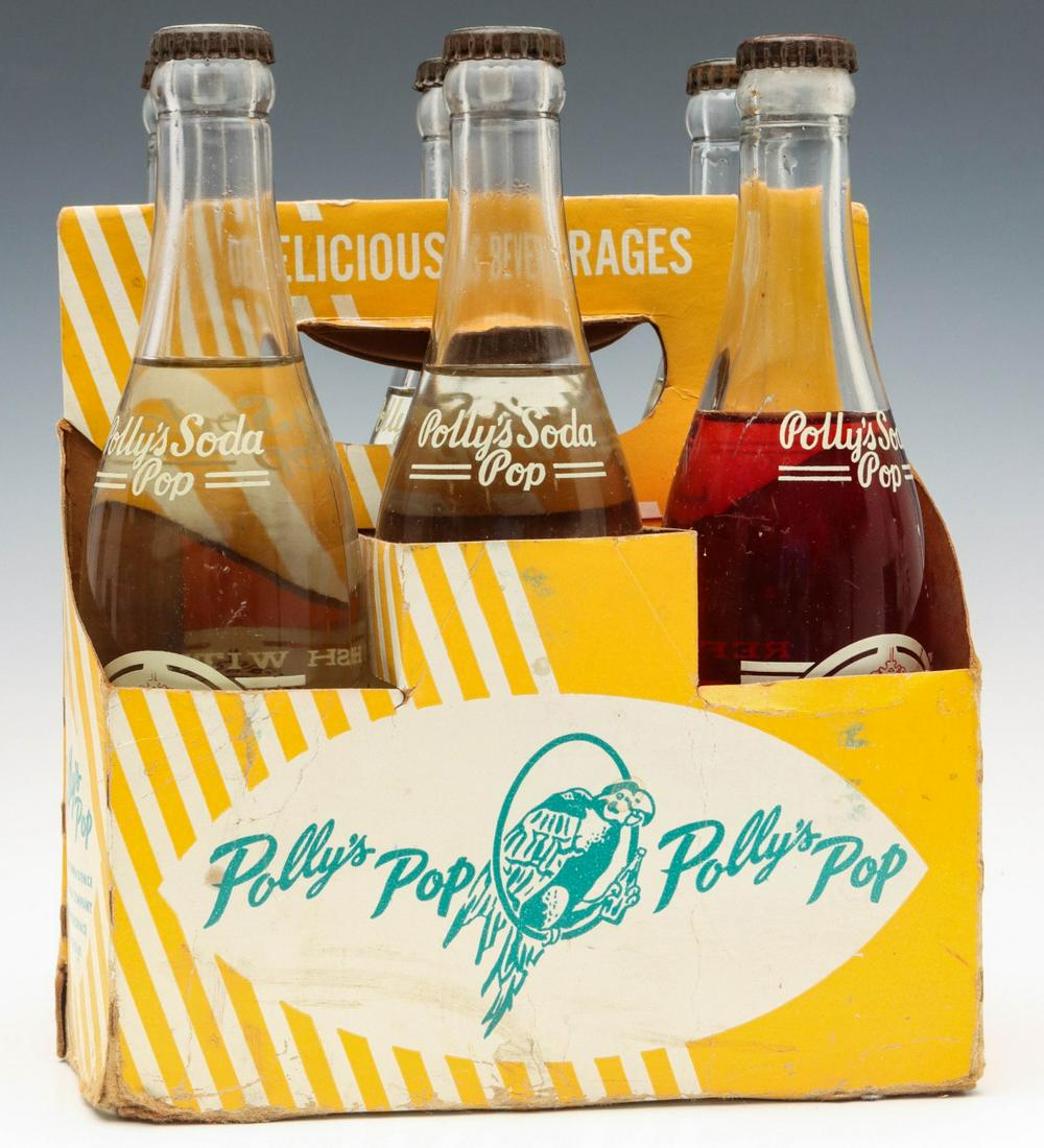 A SIX BOTTLE CARRIER WITH ORIGINAL UNOPENED POLLY'S POP: The selection of various full unused bottles with applied color label from the scarce Independence, Missouri bottler's offering circa mid 20th century. Standard sizes. Provenance: When Louis L. 'Polly