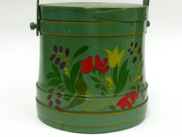 A DECORATED WOOD FIRKIN: Green painted, floral design on lid. 10 x 10 inches.