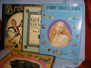 LOT OF FOUR ILLUSTRATED CHILDRENS BOOKS: Pushkin, Aleksandr. The Golden Cockerel.... NY: Doubleday, [1990]. 1st. DJ. Near fine. Illustrated by Boris Zvorykin; intro by Nureyev. Takashi, Takako. Fairy Tale Land. Art Doll Illustrations. Tokyo: