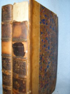 Early Lord Byron: Byron, Lord. Don Juan. London: Hunt and Clark, 1827. Two volumes. 3/4 leather with marbled boards. Both board detached on volume 1; front board detached on volume 2. Spines darkened. Top edge gilt.