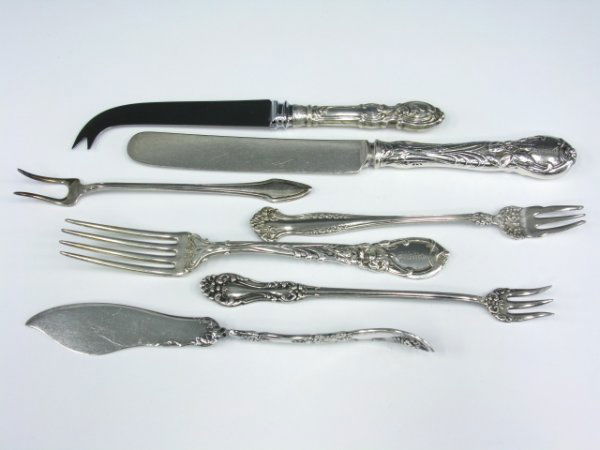REED & BARTON LA PARISIENNE STERLING KNIVES & FORKS: 8 forks, 7 inch lengths, 411 grams; six knives (engraved "Mitte" to handle), all sterling. Also Rogers Bros butter knife and three forks.