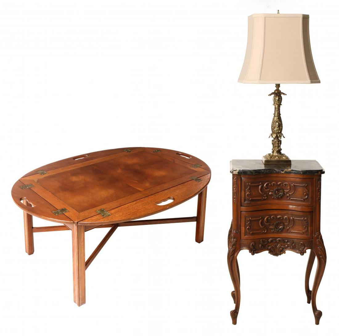 GROUPING: A FRENCH STYLE STAND, BUTLER'S TABLE AND LAMP: A late 20th century coffee table signed Brandt by brass tag, a good French style stand with black marble, and an ornate brass lamp of Rococo style. The table measures 17 x 44 x 31 inches, the stand me