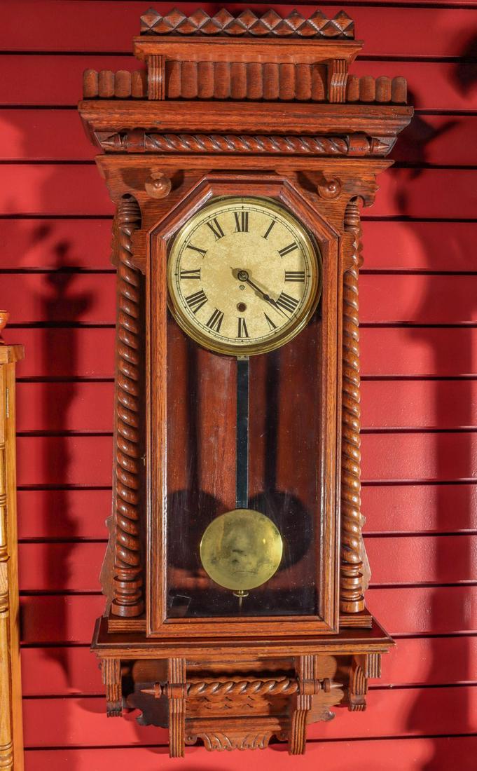 AN ANSONIA QUEEN ANN WALL CLOCK (1 of 10)