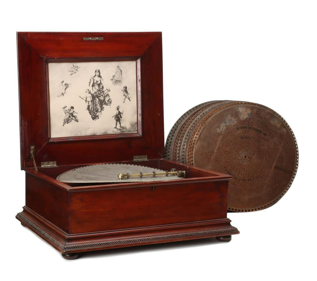 A REGINA DOUBLE COMB DISC MUSIC BOX IN MAHOGANY CASE (1 of 20)
