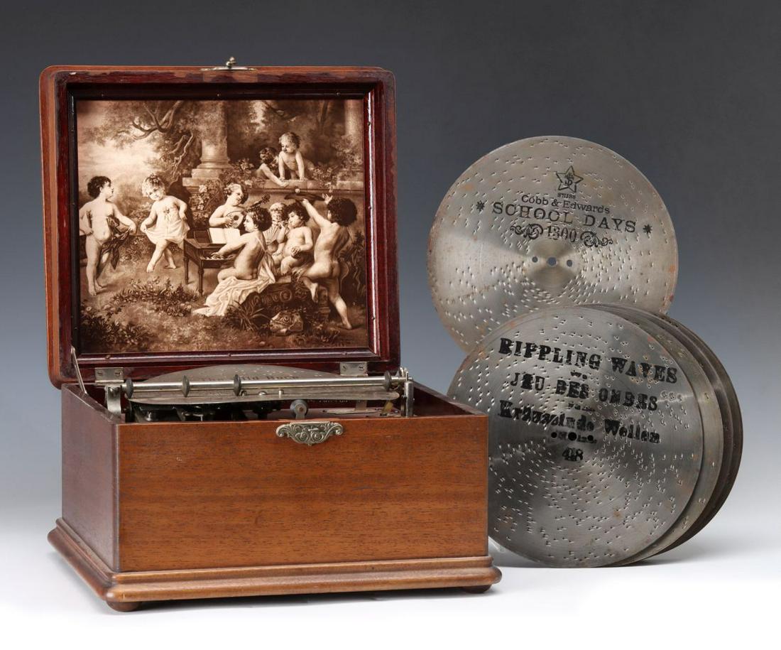 A NICE MAHOGANY CASE MIRA DISC MUSIC BOX WITH DISCS (1 of 19)