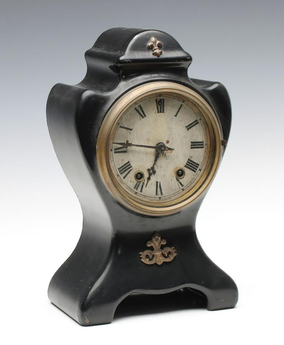 A WATERBURY PAINTED IRON CLOCK WITH FLEUR DES LIS (1 of 16)