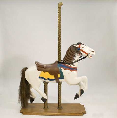 1910'S-ERA CAROUSEL HORSE & OAK BASE: Measures 68.5 x 41 x 14.5 inches. Restored by Clarence Tohill, a period piece in the manner of C.J. Parker of Leavenworth, KS. Horsehair tail, leather bridle.